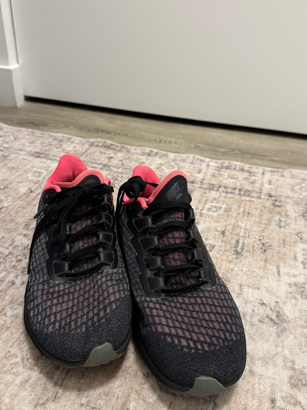 Nike Black Sneaker with Bright Pink Lining